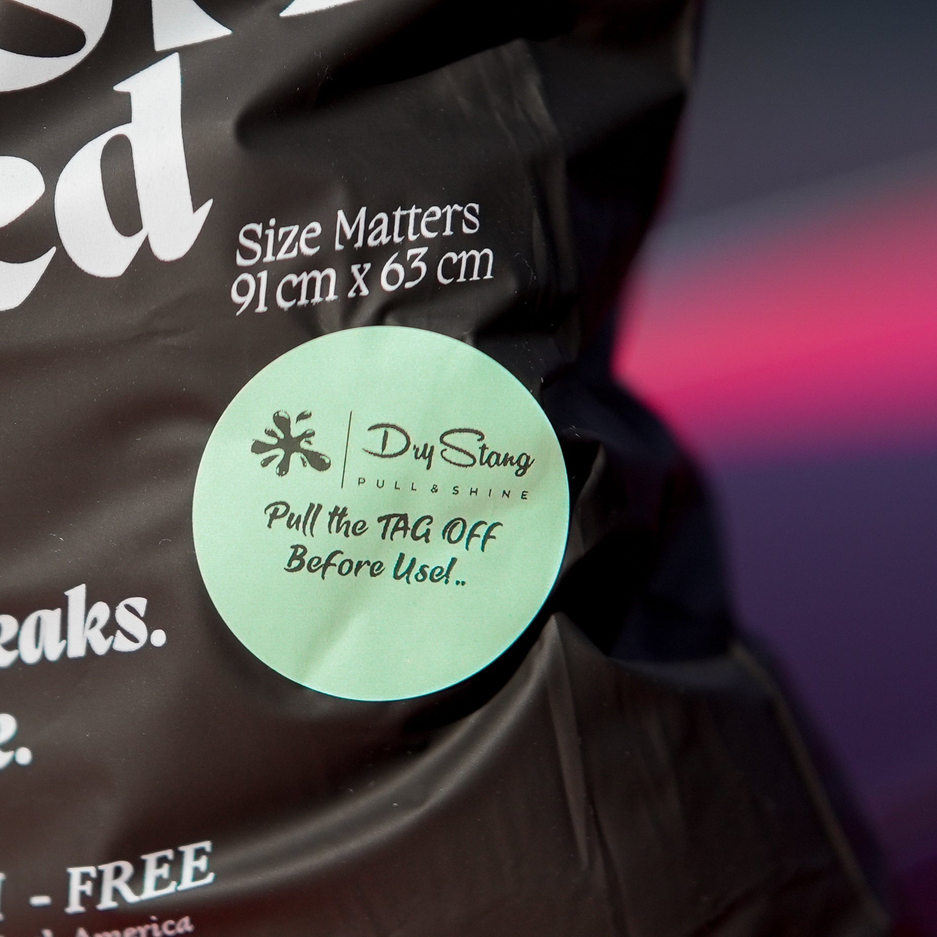 car drying microfiber towel packaging with a label and text on a dark background